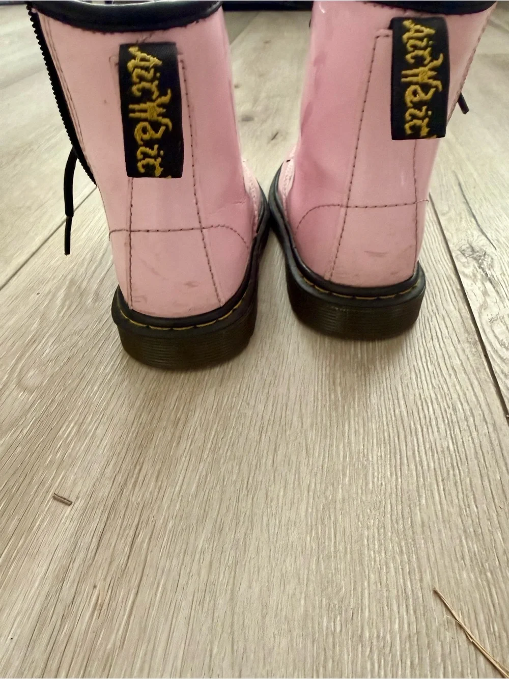 Dr. Martens Pink Lace-Up Kids Combat Boots with Black Laces